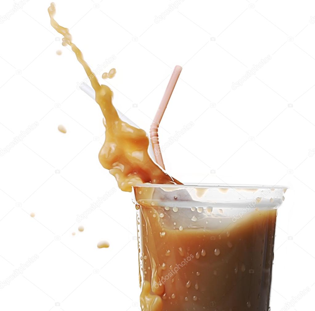 Cup of ice coffee with splashes