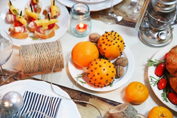 Pomanders on a Christmas table dinner — Stock Photo, Image