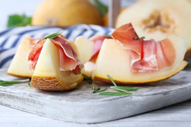 Parma ham ahşap tablo, closeup prosciutto ile kavun