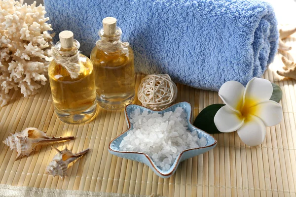 Beautiful spa treatments on decorated bamboo background — Stock Photo, Image