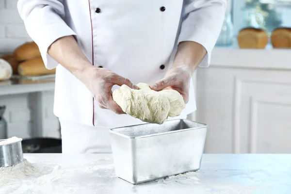 Making dough by male hands — Stock Photo, Image