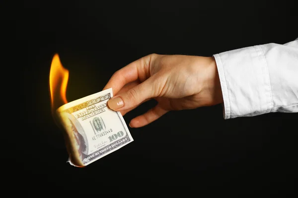 Woman burning dollars — Stock Photo, Image