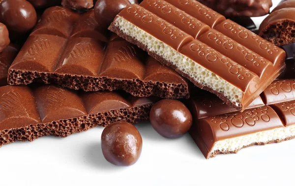 Mix van chocolade op tafel, close-up — Stockfoto