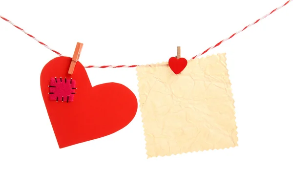 Corazones de papel y hoja vacía — Foto de Stock