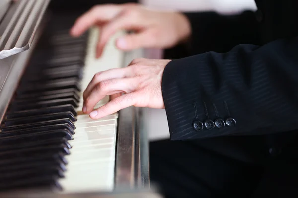 Male hands piano playing — Stock Photo, Image