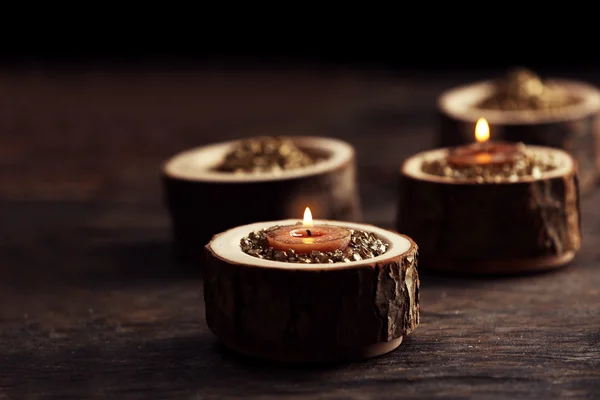 Burning wooden candles — Stock Photo, Image