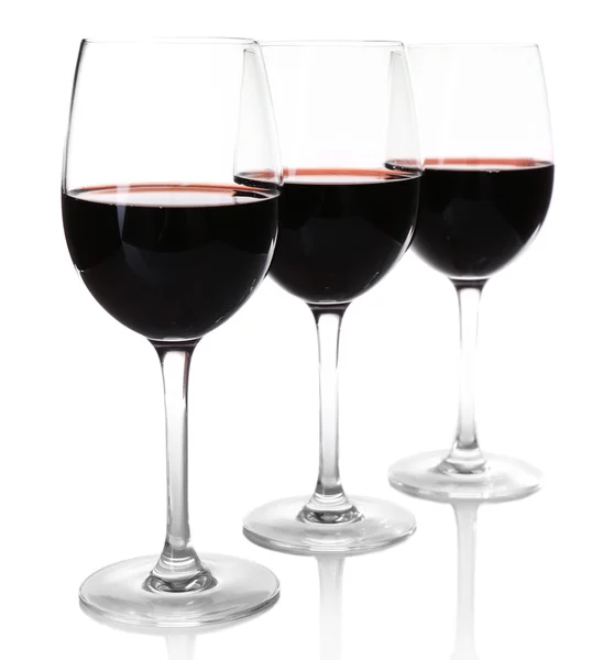 Three glasses of red wine on light background — Stock Photo, Image