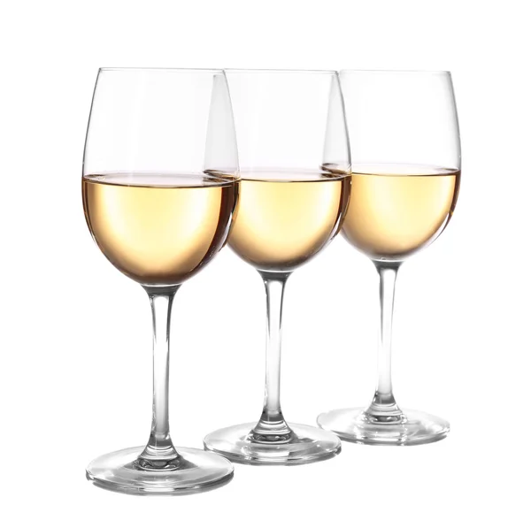 Three glasses of wine on light background — Stock Photo, Image