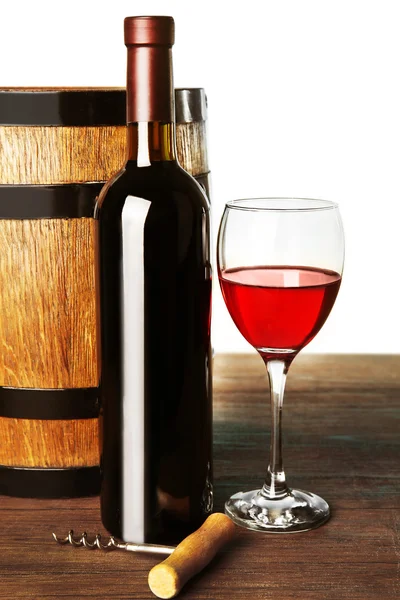 Wine in glass and in bottle on blurred natural background — Stock Photo, Image