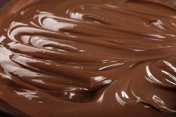 Background of melted milk chocolate, close-up — Stock Photo, Image