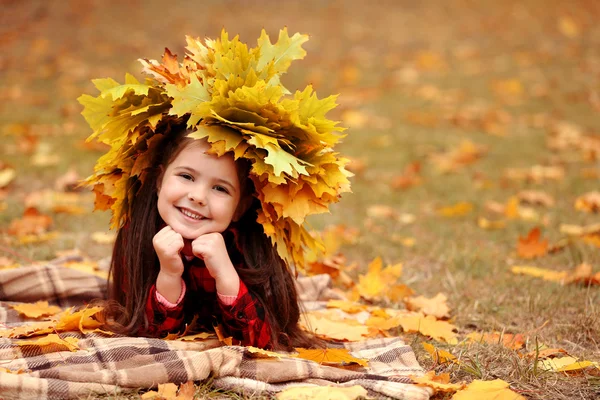 Happy young girl in yellow  wreath — Stock Photo, Image