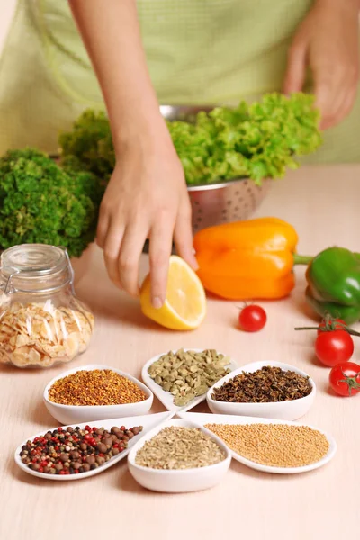 Variety of spices in ceramic containers Stock Photo