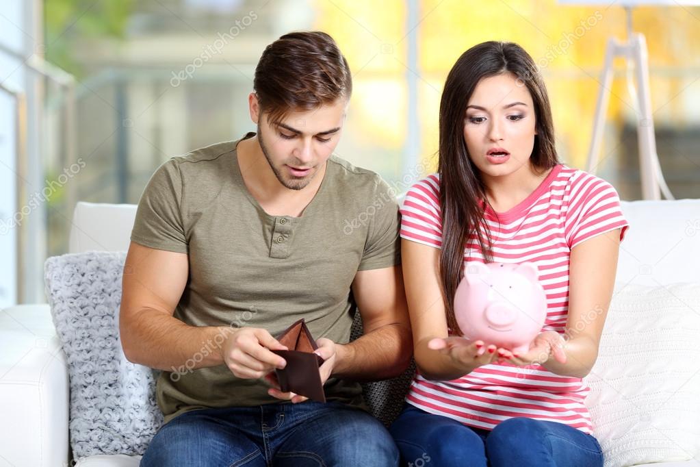 Happy couple counting money 