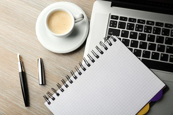 Notebook on laptop keyboard — Stock Photo, Image