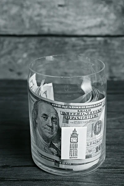Rollo de billetes en dólares para diferentes necesidades — Foto de Stock