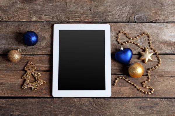 Tablet and Christmas decor — Stock Photo, Image