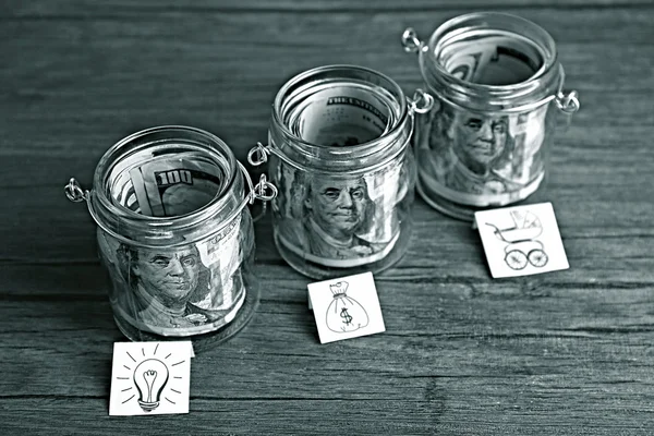 Jars full of banknotes — Stock Photo, Image