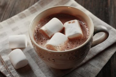 Pamuk peçete, hatmi ile sıcak kakao fincan kadar yakın