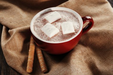 Pamuk peçete, hatmi ile sıcak kakao fincan kadar yakın