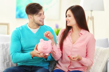 Happy couple counting money clipart