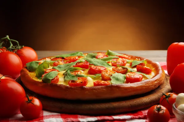 Pizza Margherita with vegetables on brown background — Stock Photo, Image