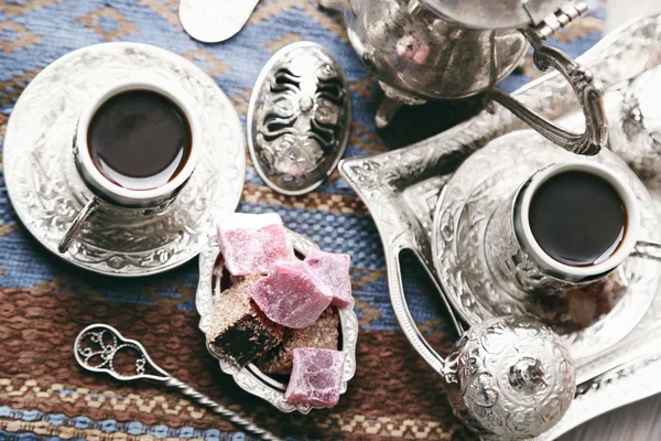 Antique tea-set with Turkish delight on table close-up — Stock Photo, Image