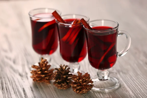 Mulled wine on wooden table — Stock Photo, Image