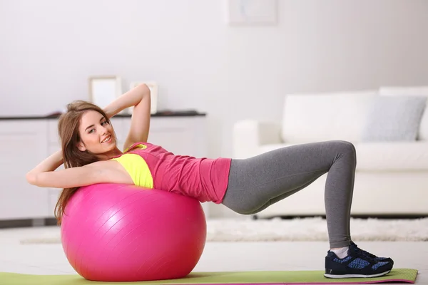 Young girl doing exercises — Stock Photo, Image