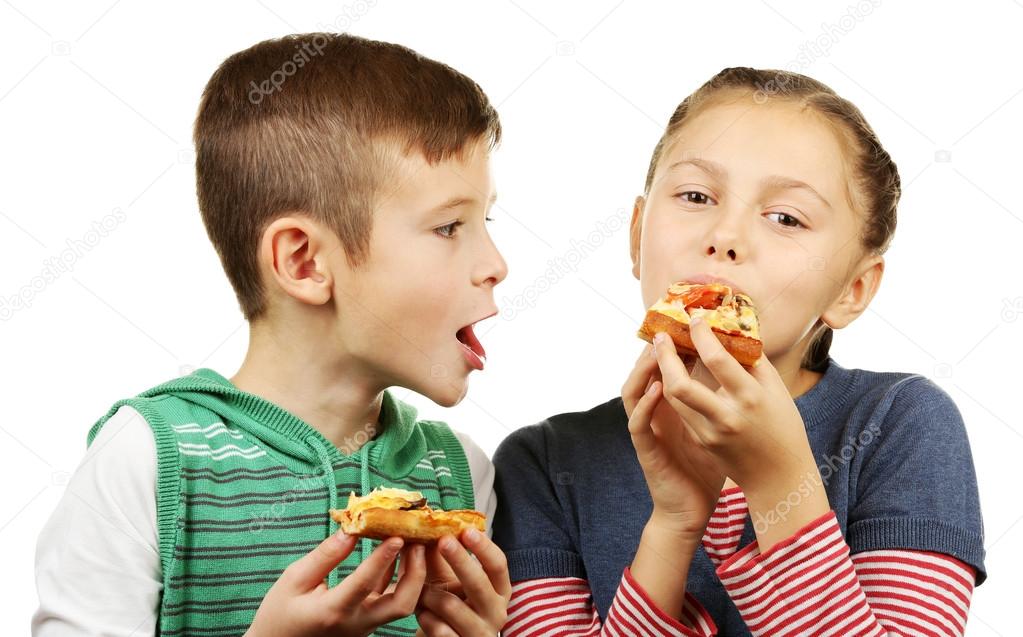 Children eating pizza  