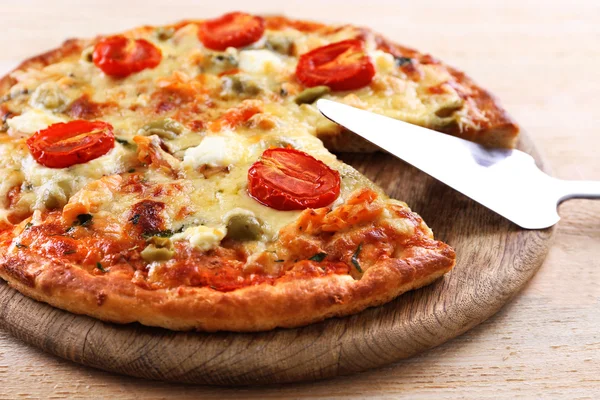 Delicious tasty pizza with shovel, closeup — Stock Photo, Image