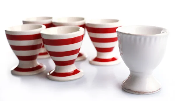 Red and White stripe egg cups, isolated on white — Stock Photo, Image