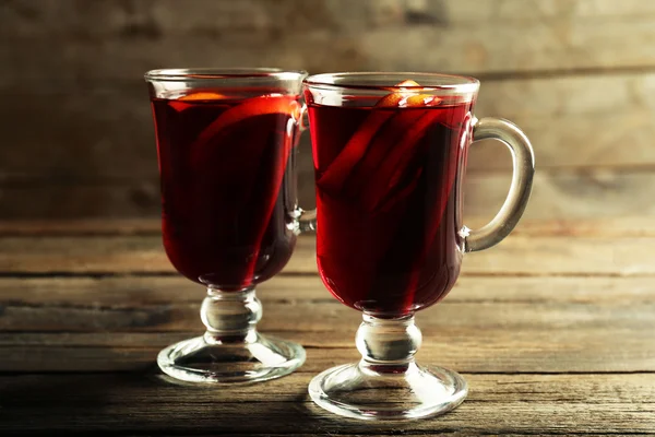 Mulled wine on wooden table — Stock Photo, Image