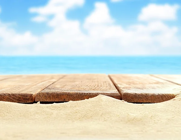 Sand with wooden planks — Stock Photo, Image