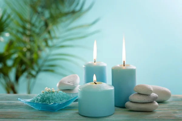 Blue candles with spa salt