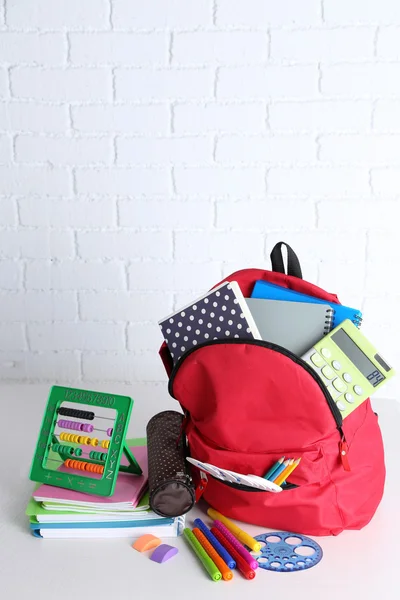 Backpack with school supplies — Stock Photo, Image