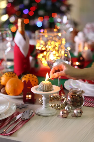 Candle on holiday table setting — Stock Photo, Image