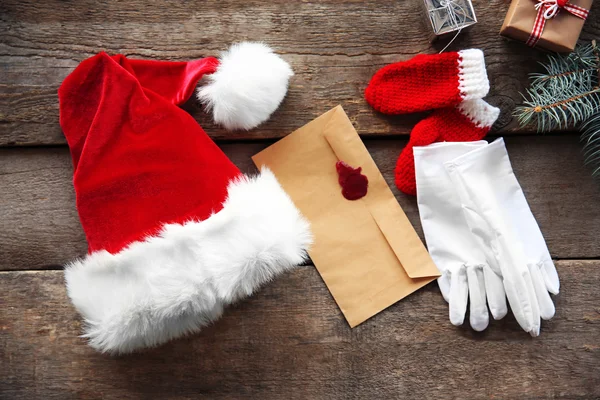 Santa Claus costume on wooden background, close up — Stock Photo, Image