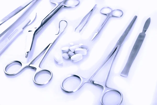 Surgery instruments on white — Stock Photo, Image