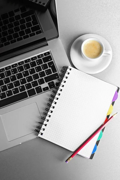 Notebook on laptop keyboard — Stock Photo, Image