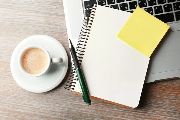 Notebook on laptop keyboard — Stock Photo, Image