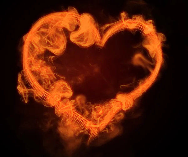 Corazón de fuego en el fondo — Foto de Stock