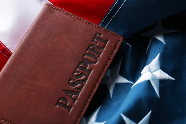 Passport lying on American Flag — Stock Photo, Image