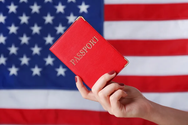 Hand holding American passport — Stock Photo, Image