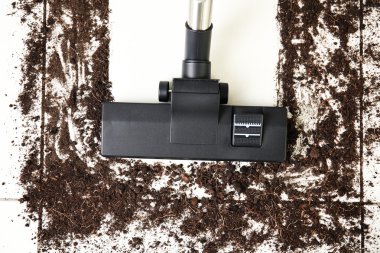 Halı süpürge ve toz