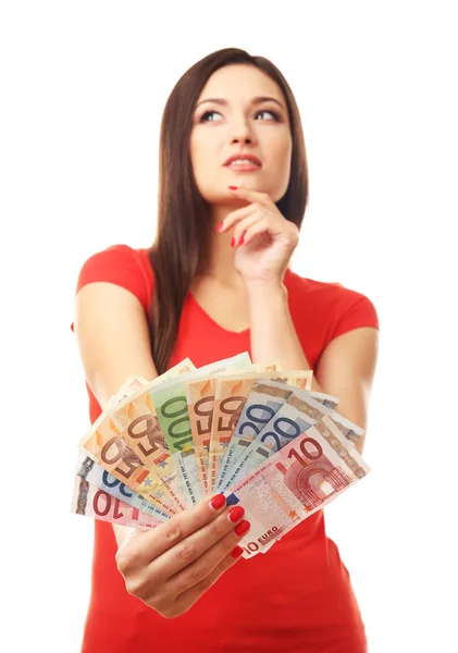 Žena držící peníze izolovaných na bílém — Stock fotografie