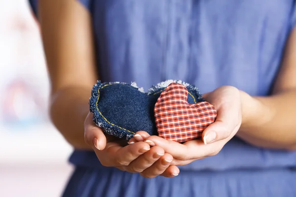 Craft hearts in female hands — Stock Photo, Image