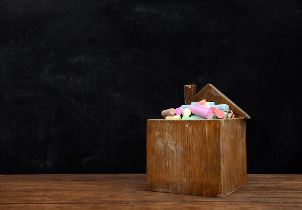 Wooden box of coloured chalk — Stock Photo, Image