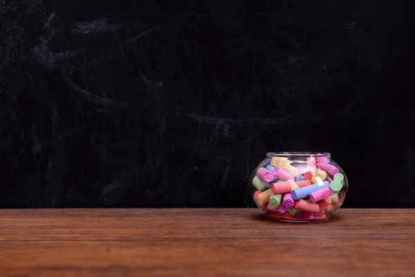 Glass jar with coloured chalk — Stock Photo, Image