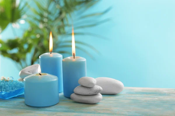 Blue candles with spa salt