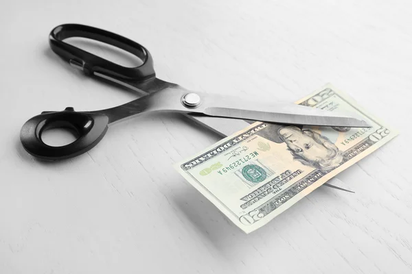 Scissors cuts dollar — Stock Photo, Image